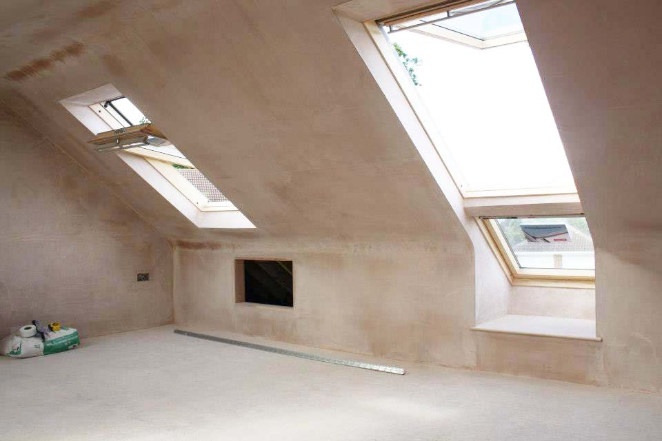 PlasteringServices Plaster finish on wall with 2 skylights in loft conversion